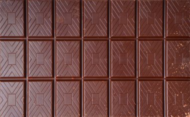 Fındık arkaplanlı çikolata çubuğu.