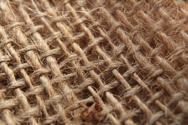 Pytlová tkanina na pozadí textury. Makro fotografie žíněné stuhy — Stock fotografie