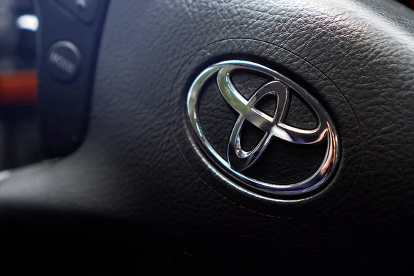 Illustrative editorial of Toyota Logo on the steering wheel of the car. KHARKIV, UKRAINE - 18 May, 2020