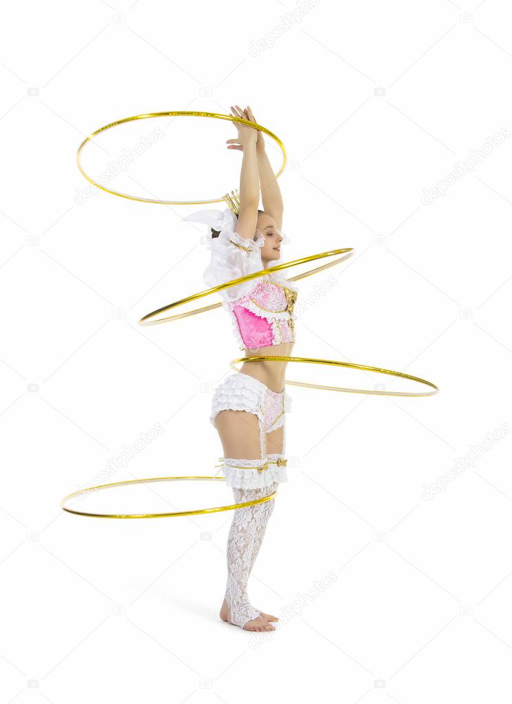 Gymnast standing twirling a hula hoop