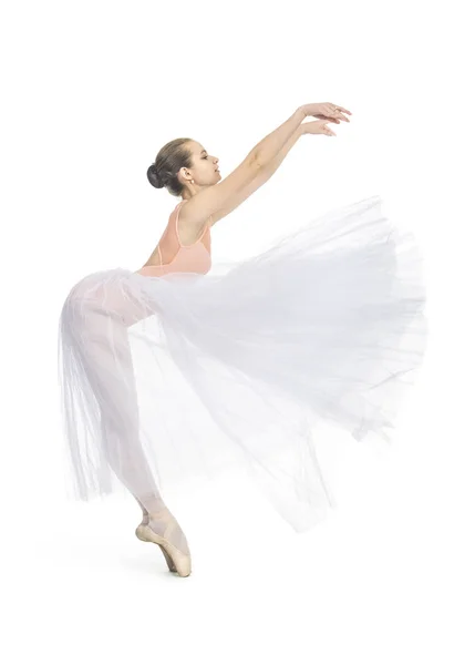 Chica joven y sonriente bailando el ballet . — Foto de Stock