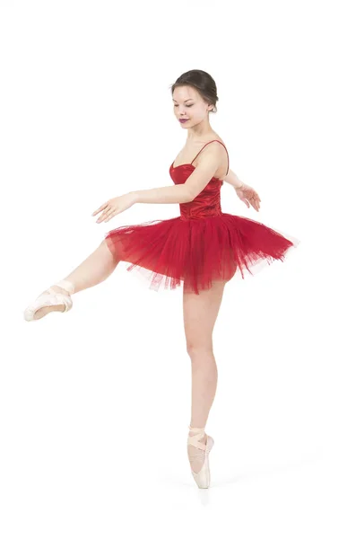 Ballerina i en röd tutu. — Stockfoto