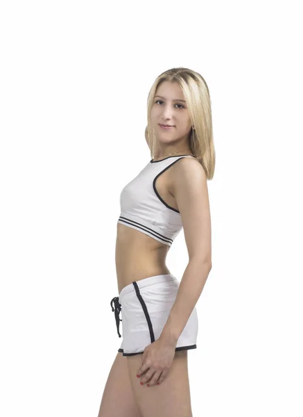 Junge Frau beschäftigt sich mit Fitness und Yoga. — Stockfoto