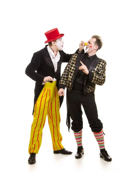Twee gelukkige clowns met een grappige uitdrukking. — Stockfoto