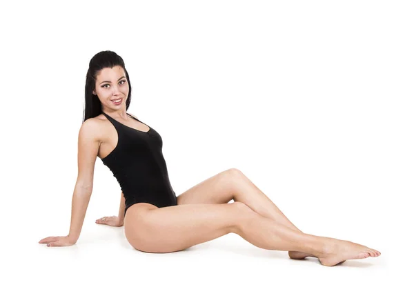 Mladá žena se zabývá fitness a jógy. — Stock fotografie