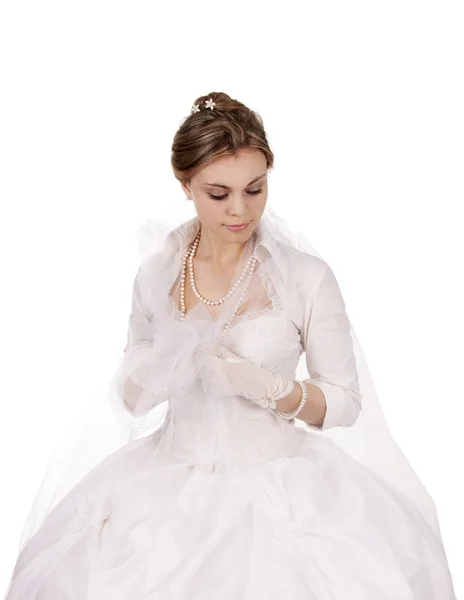 Retrato de una chica encantadora en un vestido blanco en estilo retro, la novia en un vestido retro . — Foto de Stock