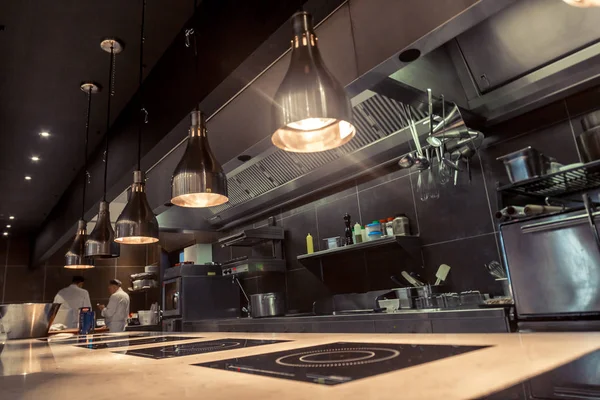 Professional kitchen , view counter in stainless steel . Bokeh . — Stock Photo, Image