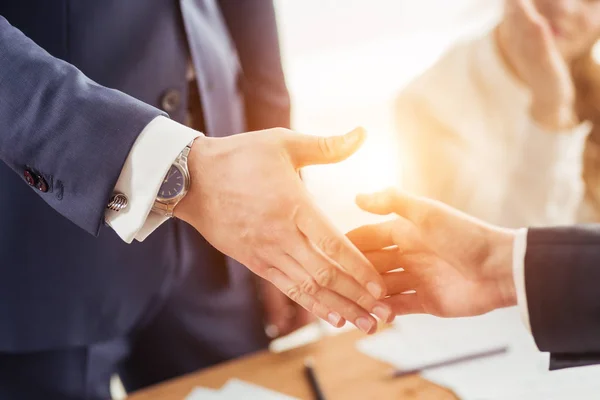 Business handshake. blured people at background — Stock Photo, Image