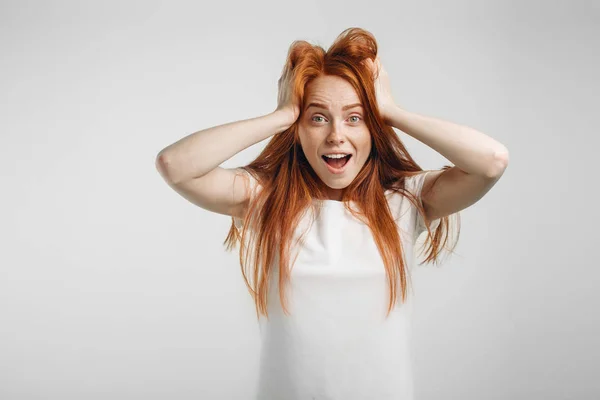 Close up portrait of surprised happy freckled redhead girl. — Stock Photo, Image
