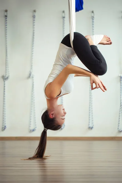 Lotus pose in aero anti gravity yoga. Aerial exercises — Stock Photo, Image