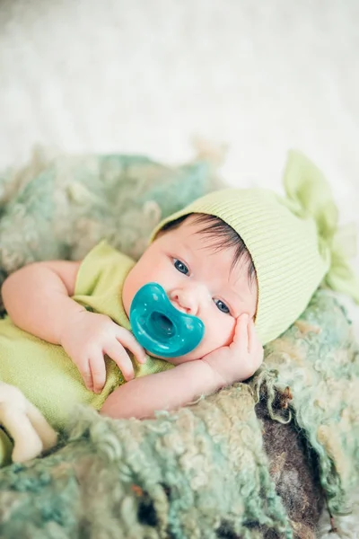 Portrait of a newborn with a pacifier — Stock Photo, Image