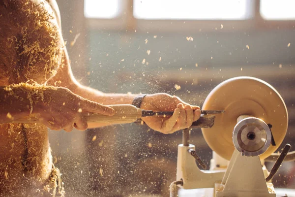 Wood lathe. Carpenter lathing wood — Stock Photo, Image