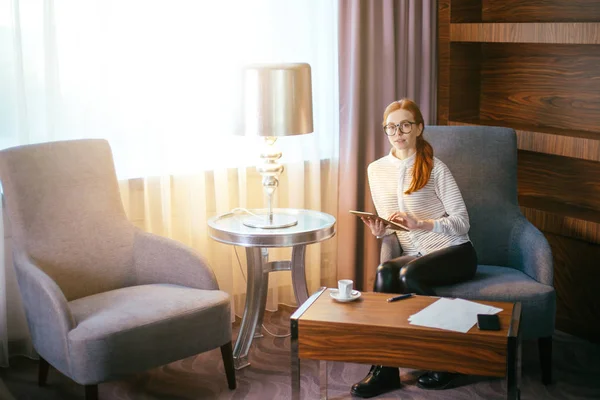 Female wear glasses work on digital tablet during break — Stock Photo, Image