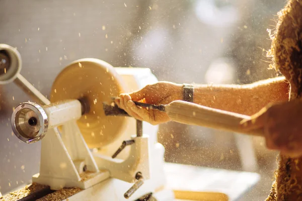 Wood lathe. Carpenter lathing wood — Stock Photo, Image