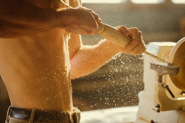 Wood lathe. Carpenter lathing wood — Stock Photo, Image