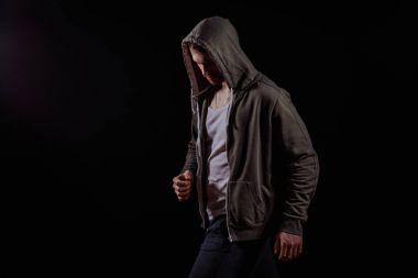 yan görünümü fotoğraf izole hoodie bowerd kafa ile genç haydut