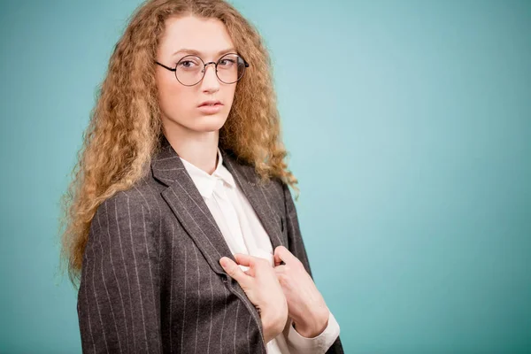 Side view shot of freezing bossy teacher wearing glasses with suit jacket — Stock Photo, Image