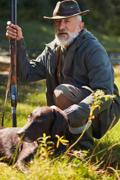 Hunting man look at prey — Stock Photo, Image