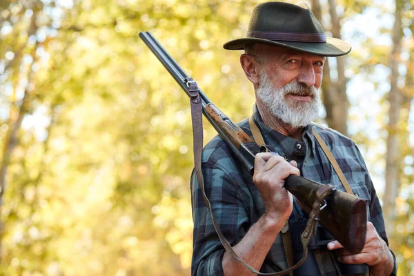 Happy man after hunting