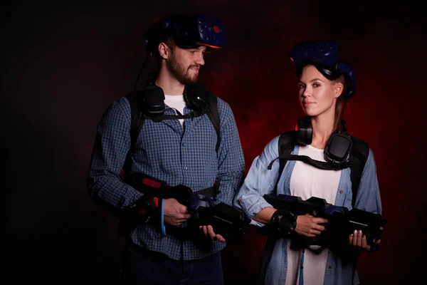 Attractive couple involved in VR game