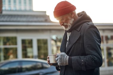 Asking for help. Senior man with grey beard asking for some money help by citizens of city clipart