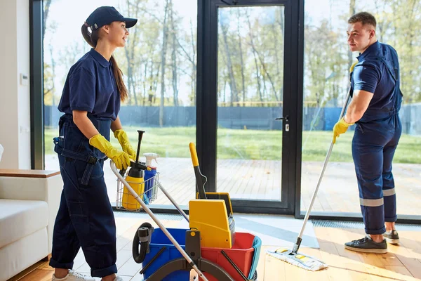 Two colleagues of cleaning service together at work — Stock Photo, Image