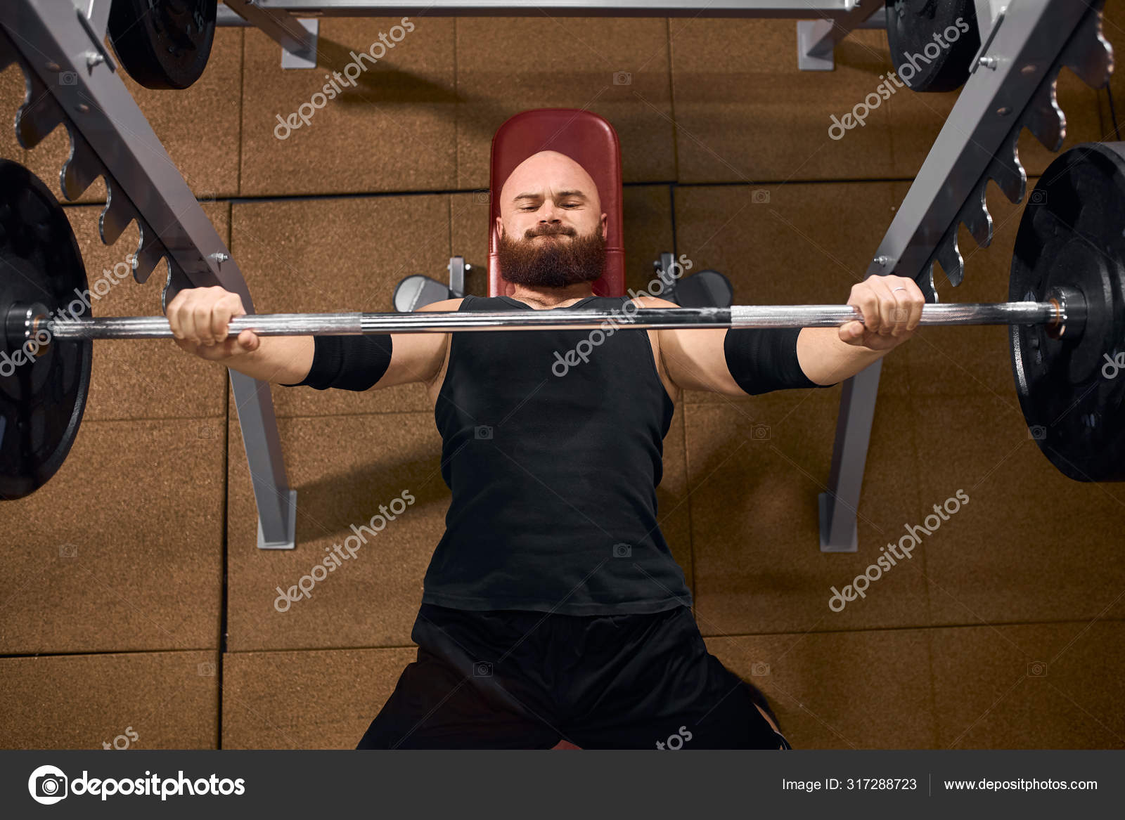 Male Powerlifter Preparing To Bench Press Stock Photo