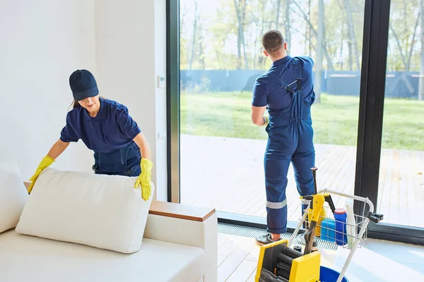 Cleaning service team working in new house — Stock Photo, Image