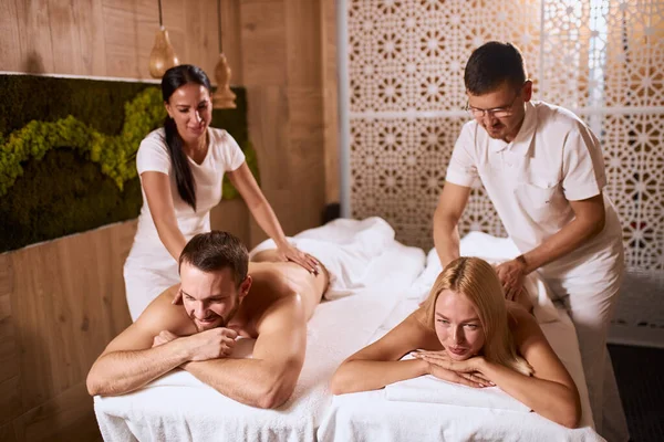 Lovely couple having good time in spa salon — Stock Photo, Image