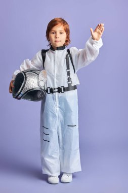 Caucasian child want to be cosmonaut in future clipart