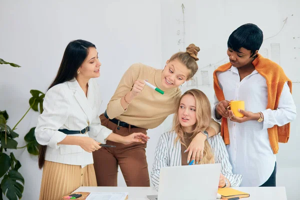 Friendly business team coworking in office — Stock Photo, Image