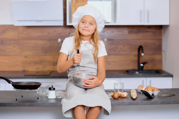 Portrait of beautiful girl kid mixing dough — Stock Photo, Image