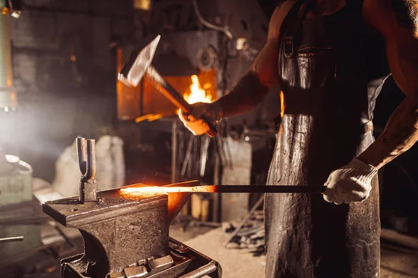 Young adult blacksmith man working — Stock Photo, Image