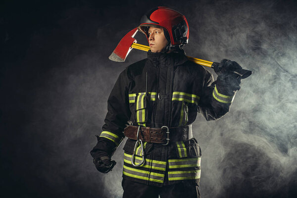 ready to save people from fire. fireman isolated