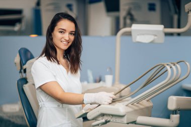 portrait of positive dentist woman