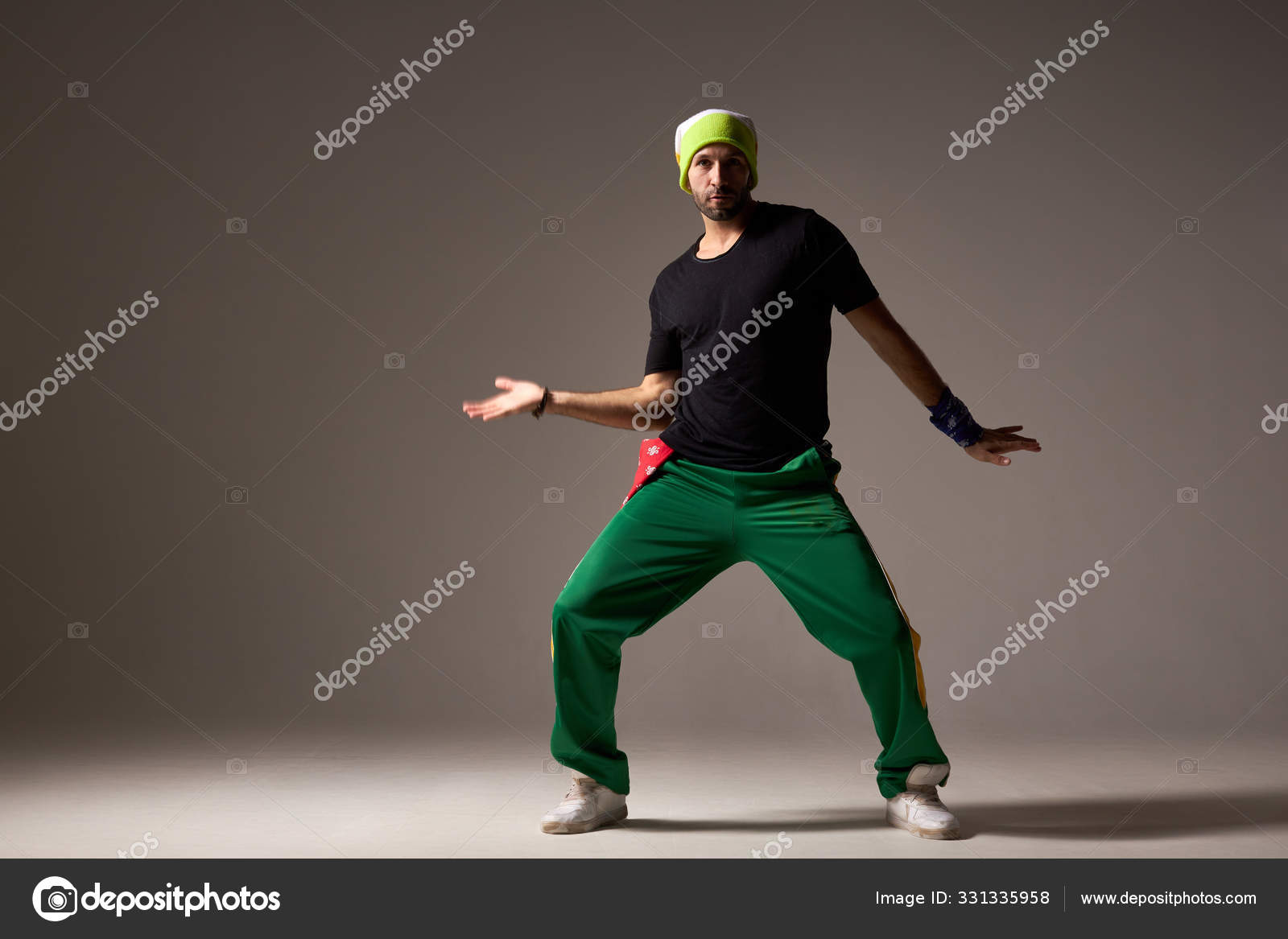 https://st3.depositphotos.com/13768208/33133/i/1600/depositphotos_331335958-stock-photo-cool-looking-dancing-hiphopper-in.jpg