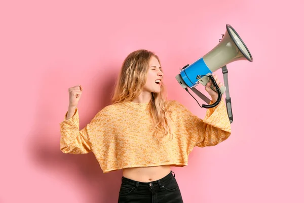 Portrait of young caucasian girl with loud speaker — Stock Photo, Image