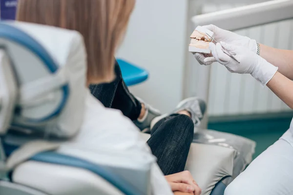 Unrecognizable doctor and patient in dental office — Stockfoto