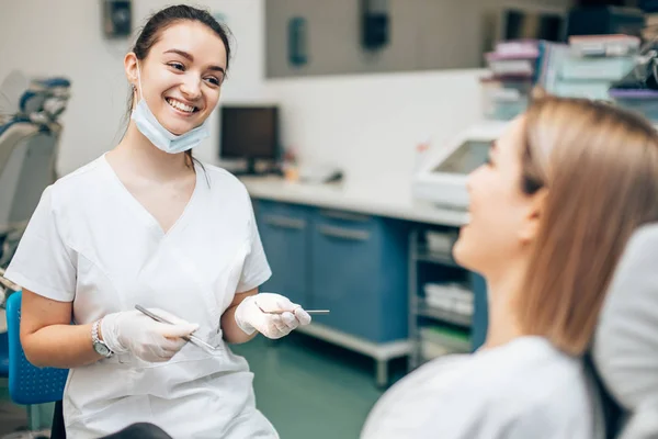 Young beautiful woman came to doctor for teeth examination — Stock Photo, Image