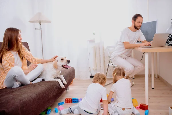 Happy family concept. young married couple with child at home — Stock Photo, Image