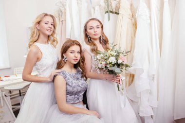 caucasian romantic ladies in wedding salon