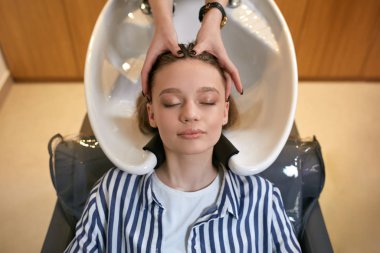 top view on young female in beauty saloon