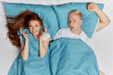 furious woman cannot sleep as she has family problem