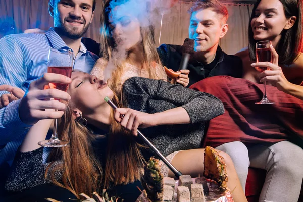 Group of young people rocking in karaoke bar — Stock Photo, Image