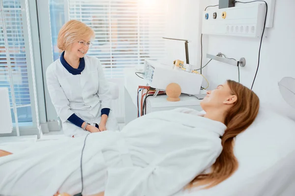 Careful nurse or doctor is always near her patient — Stock Photo, Image