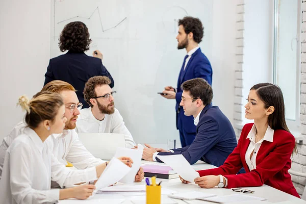 group of business leaders in business office