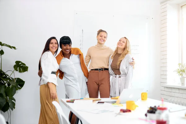 Positive diverse female in office — Stock Photo, Image