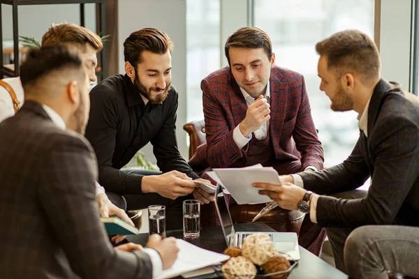 serious business people hold meeting in office