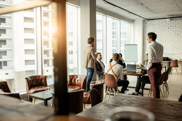 Business leaders gathered in office — Stock Photo, Image