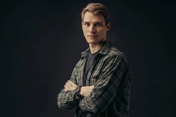 Portret van jongeman in geruit casual shirt — Stockfoto